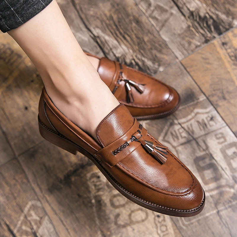 Mocasines de piel con borlas