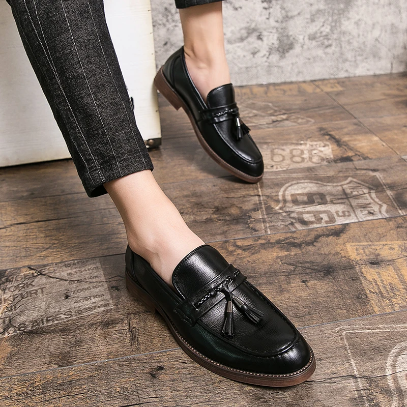 Mocasines de piel con borlas